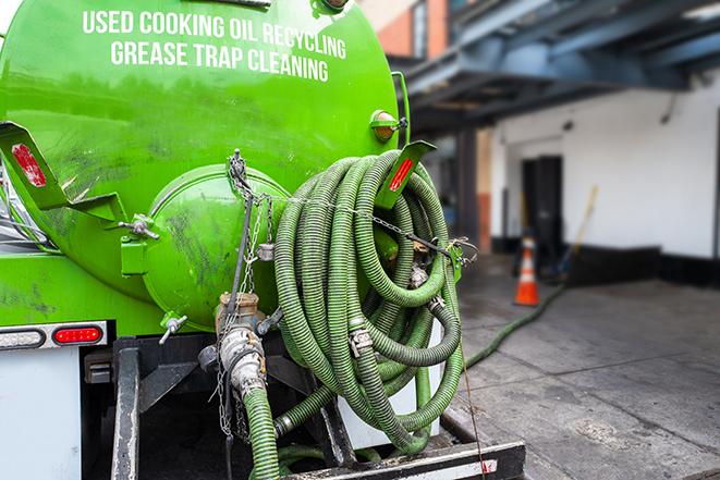 preventing clogs and odors with grease trap pumping in Rainbow City